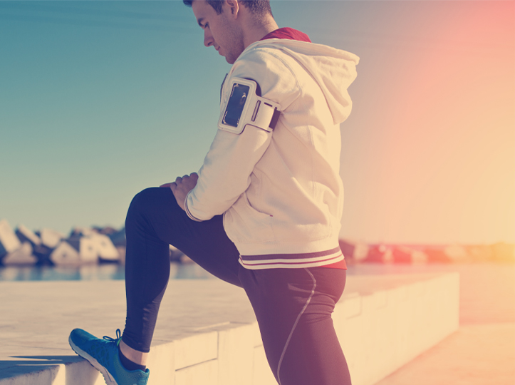 a man runner stretching leg foot movement