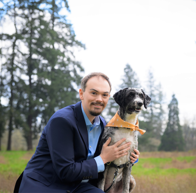 Dr. Derrick Lensgraf, chiropractor and his dog