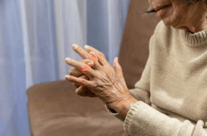 old woman suffer from carpal tunnel